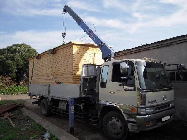 Фото Разгрузка деревянной бытовки