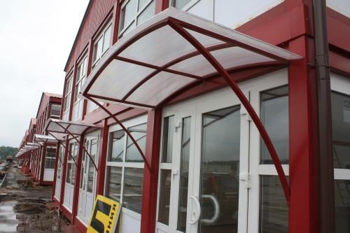 Фото Козырек из вальцованной трубы